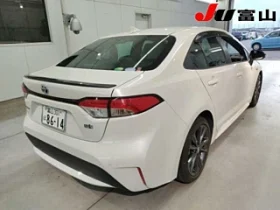 Toyota Corolla WXB 2021 White Hybrid