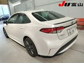 Toyota Corolla WXB 2021 White Hybrid
